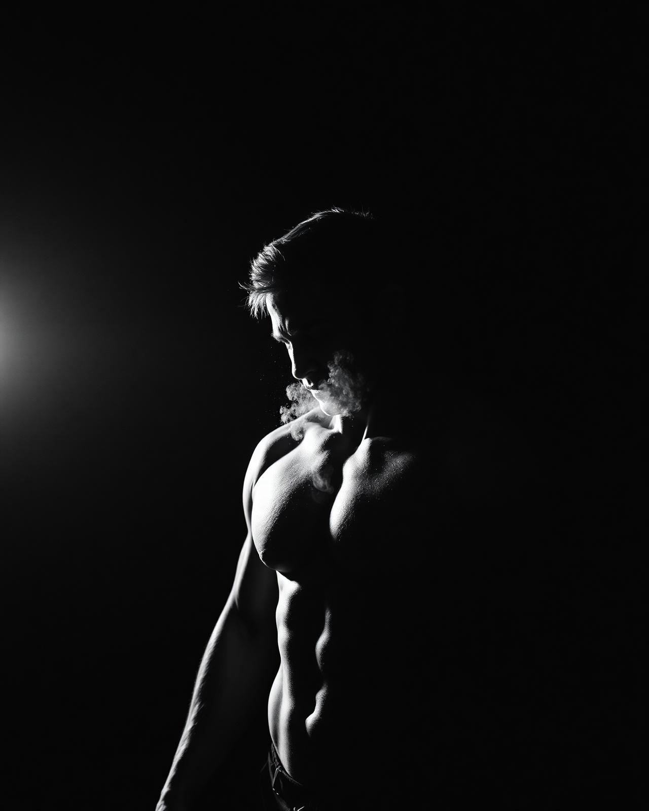 A man training in low light